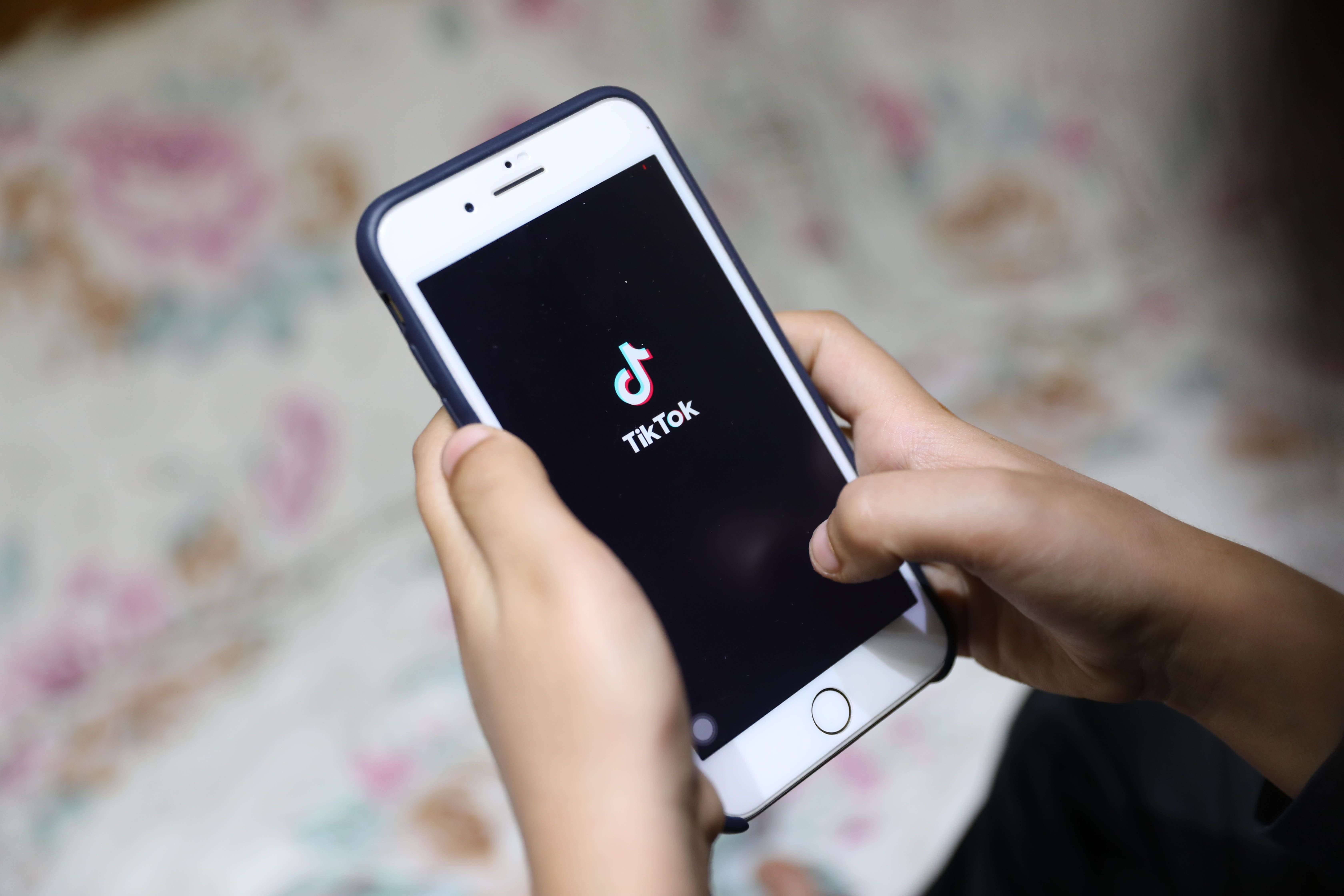 Mobile phone running the TikTok app in Cairo, Egypt.