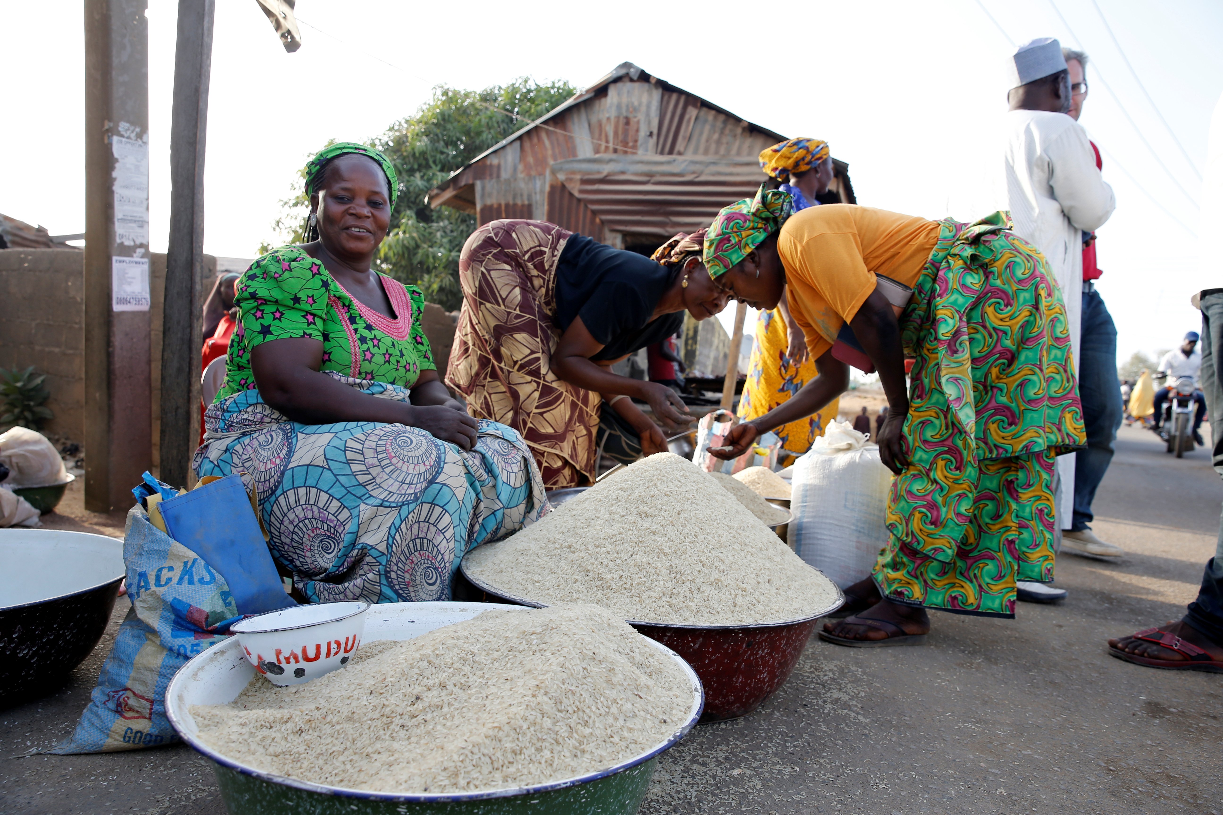 People Selling Rice Ghana and Nigeria run the great rice race