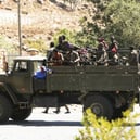 FILE PHOTO | Units of Ethiopian army patrol the streets of Mekelle city of the Tigray region, in northern Ethiopia on 7 March 2021 after the city was captured with an operation towards Tigray People’s Liberation Front (TPLF). © Minasse Wondimu Hailu / ANADOLU AGENCY / Anadolu via AFP