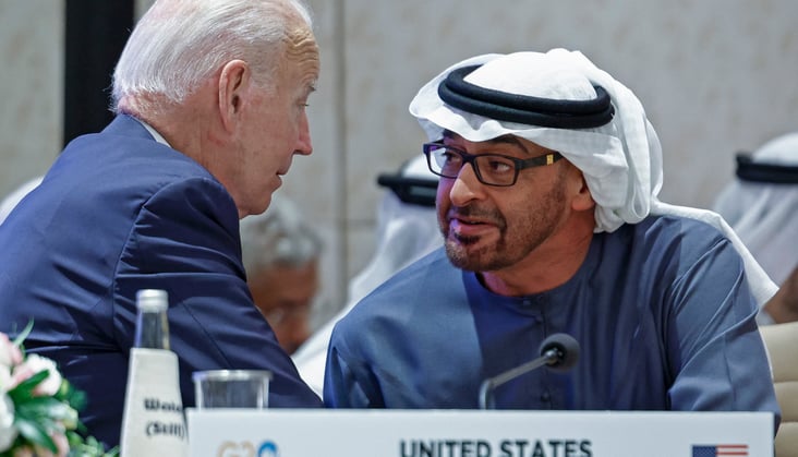 US President Joe Biden (L) speaks with United Arab Emirates President Sheikh Mohamed bin Zayed Al-Nahyan during a session at the G20 summit in New Delhi on September 9, 2023. (Photo by EVELYN HOCKSTEIN / POOL / AFP)
